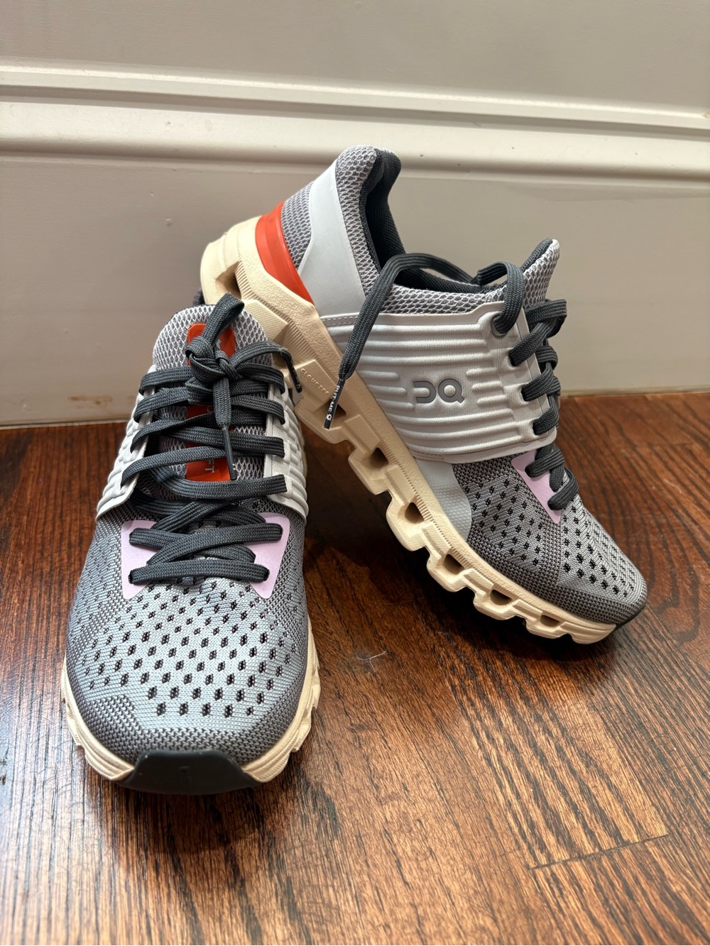 On Running Gray Sneakers with Pink Accents